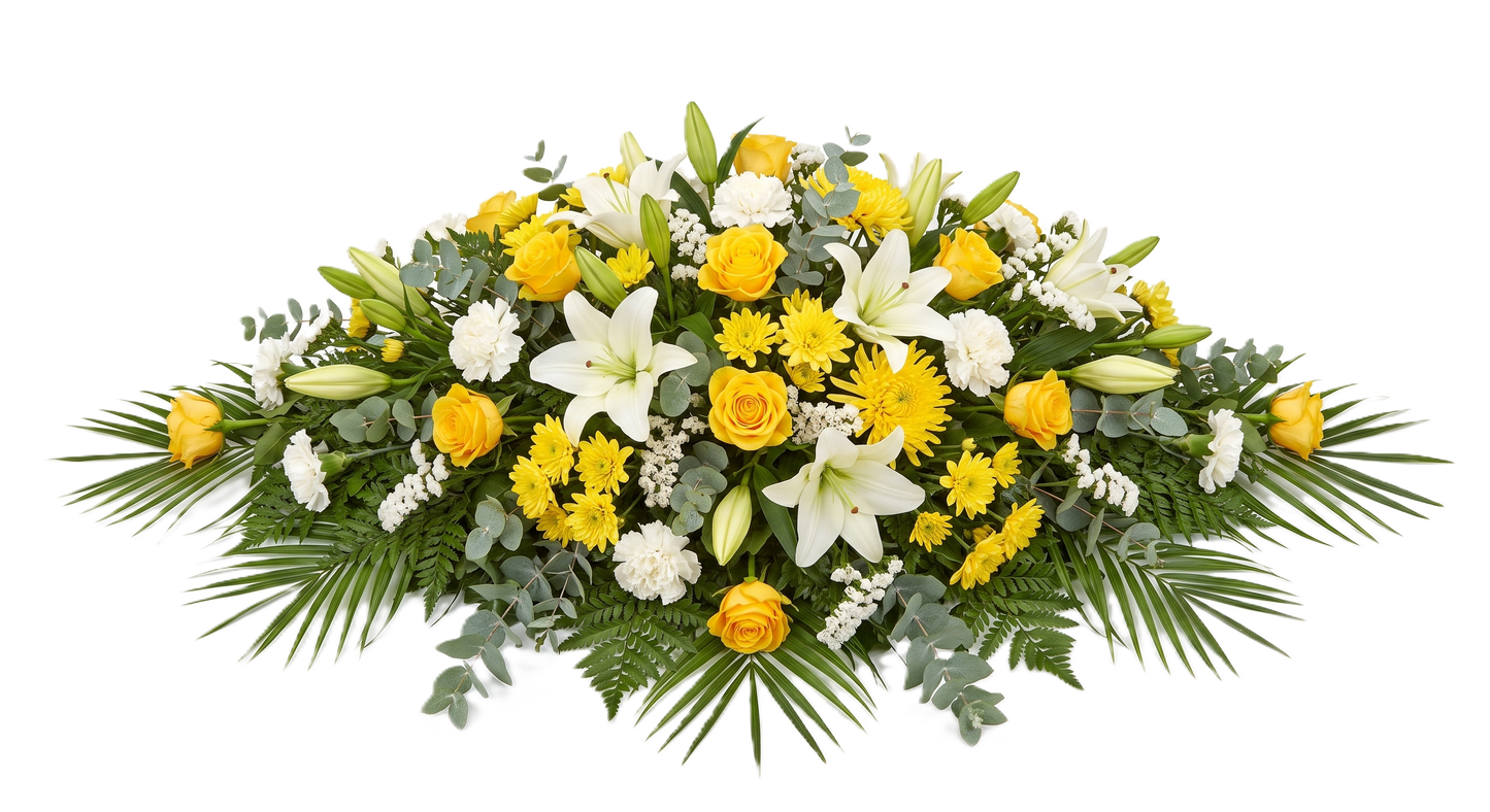 A floral arrangement for a casket, featuring yellow roses, white lilies, yellow daisies, and green foliage including palm leaves and eucalyptus, isolated on a white background.