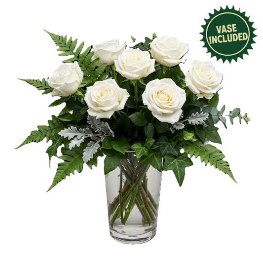 Breathtaking angelic white premium arrangement featuring white roses in a glass vase, hand-crafted for luxurious delivery in Auckland by local growers.