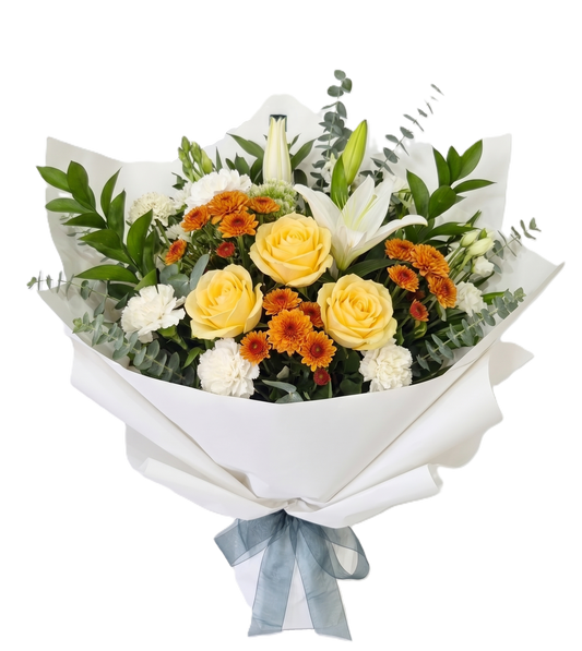 A vibrant hand-tied bouquet by Flowers on Ramarama featuring yellow roses, orange mini chrysanthemums, white lilies, and white spray carnations with eucalyptus greenery. The arrangement is wrapped in minimalist white paper and tied with a sheer blue ribbon.
