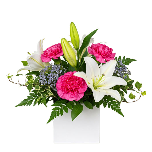 Elegant joyful grace bouquet featuring pink carnations and white lilies, hand-crafted for delivery in Auckland.