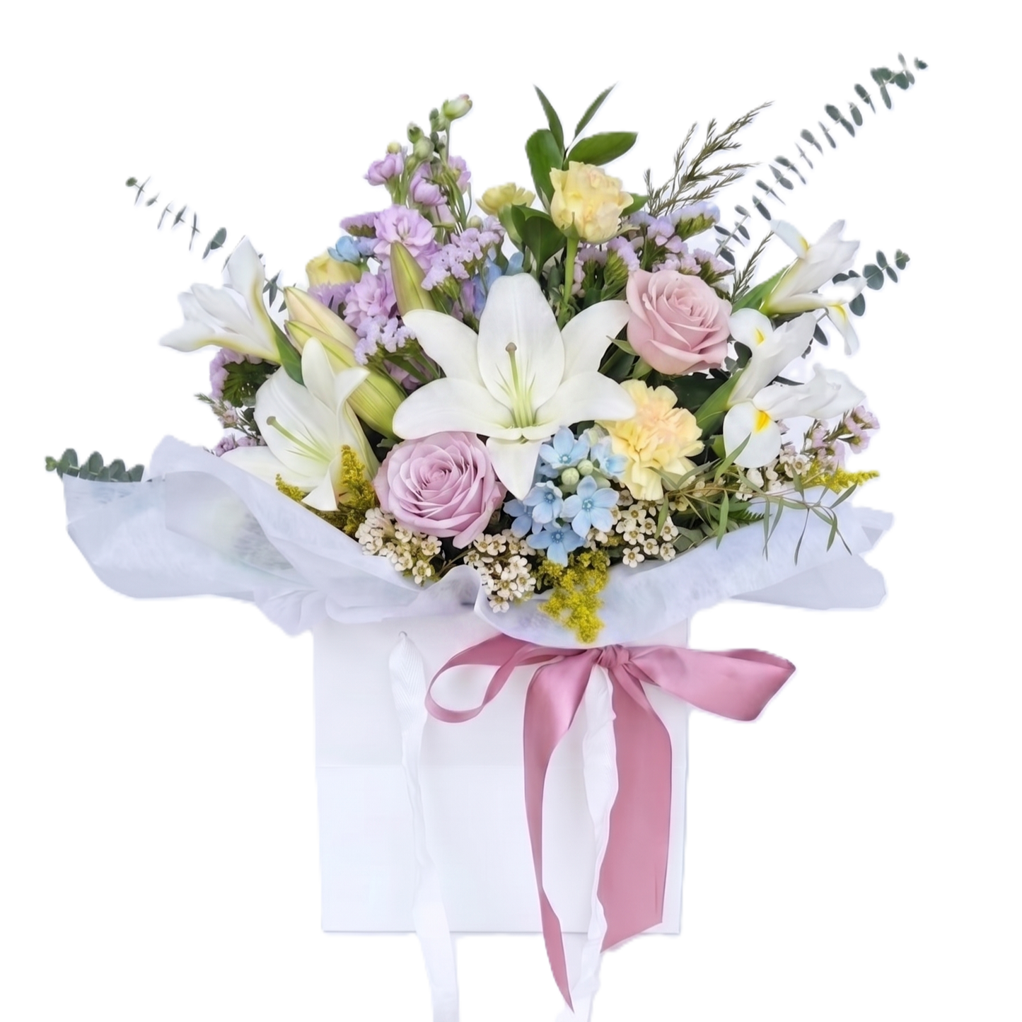 Top quality premium pastel flowers arranged with fresh foliage in a wrapped bouquet