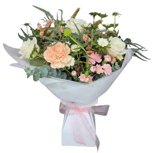 Soft pastel seasonal flowers arranged in a convenient self-watering Vox Box, ready for delivery in South Auckland.
