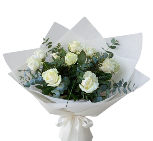 Elegant simply white bouquet featuring pristine white roses and premium greenery, hand-crafted for delivery in South Auckland.