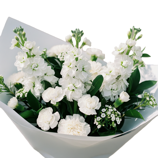 Snowy Grace elegant white floral bouquet featuring premium seasonal white blooms wrapped in paper, hand-crafted for delivery in South Auckland.