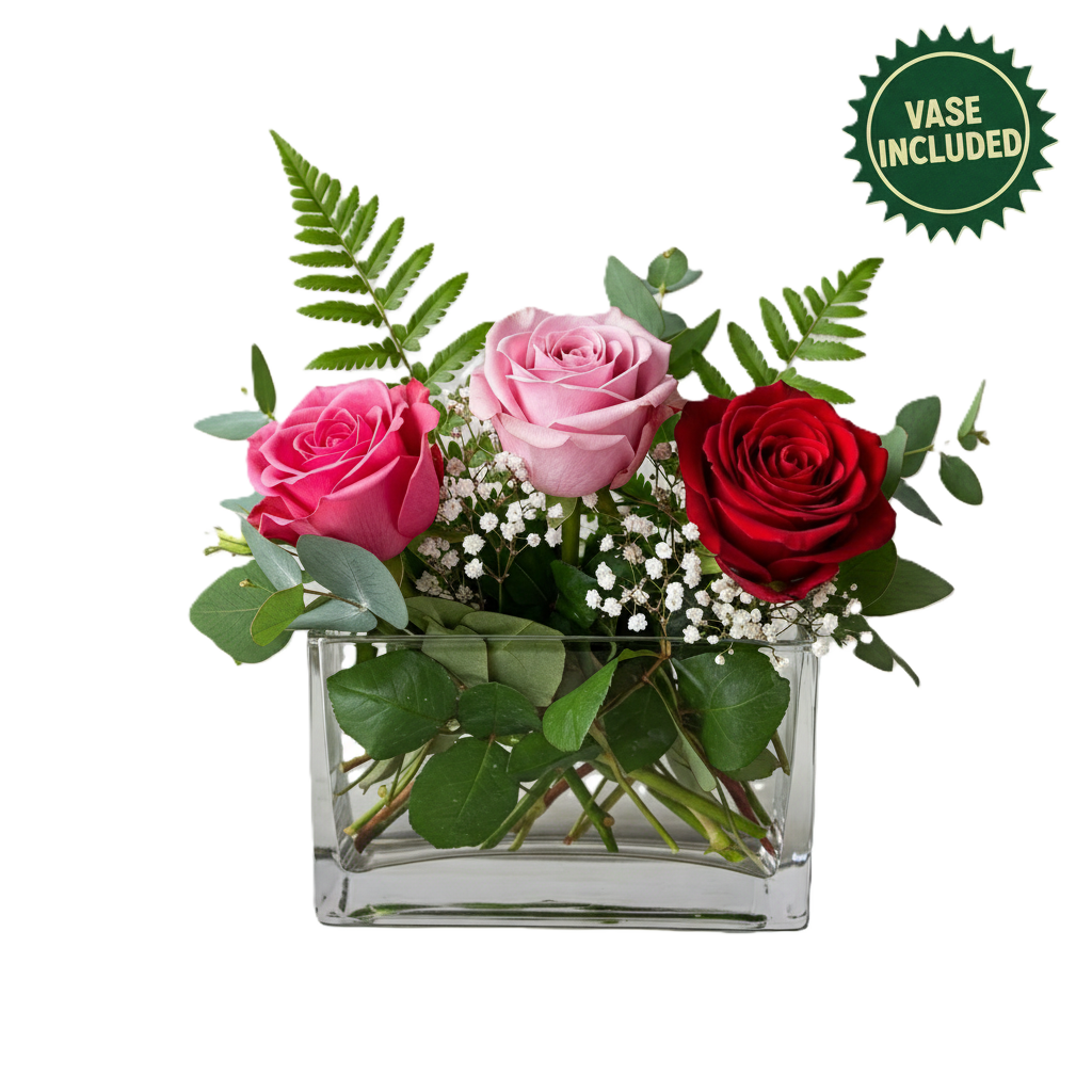 Charming sweet sentiments flower arrangement in a glass cube vase, designed for delivery in South Auckland.