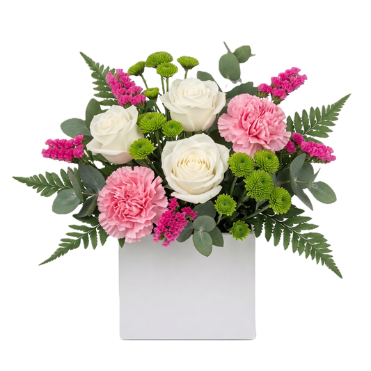 A vibrant floral arrangement featuring white roses, pink carnations, green button chrysanthemums, and eucalyptus presented in a minimalist white cardboard box. 2