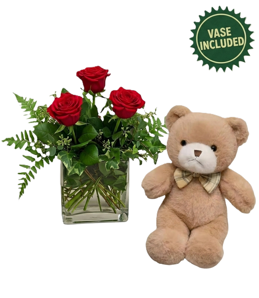 Enchanting Valentine's Day gift set featuring three red roses in a glass vase and a plush teddy bear, hand-crafted in South Auckland.