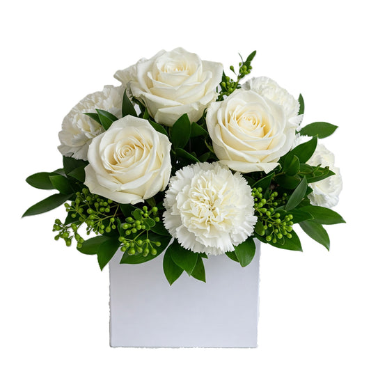 Pristine white doves flower bouquet featuring elegant white blooms and fresh greenery, hand-crafted for delivery in Auckland.