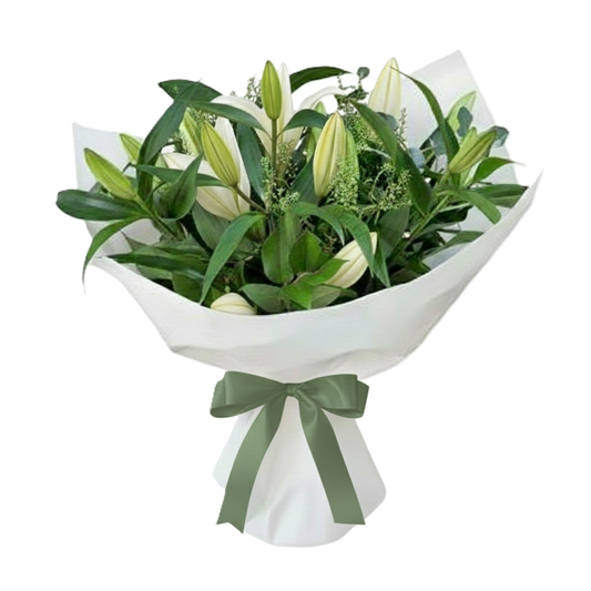 Elegant white serenity bouquet featuring premium white lilies and fresh greenery, hand-crafted for delivery in Auckland.